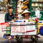Tired street vendors in Saigon
